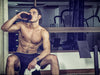 Protein shake before or after workout: Man drinking