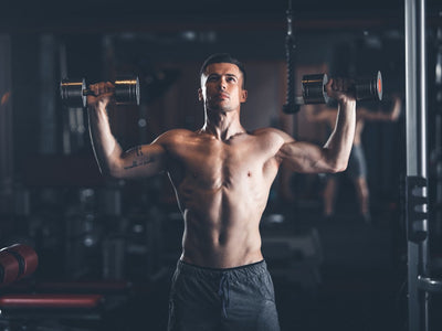 Best shoulder workout: Man lifting dumbbells